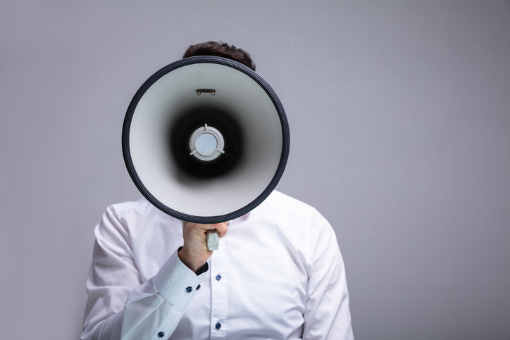 Business man with megaphone