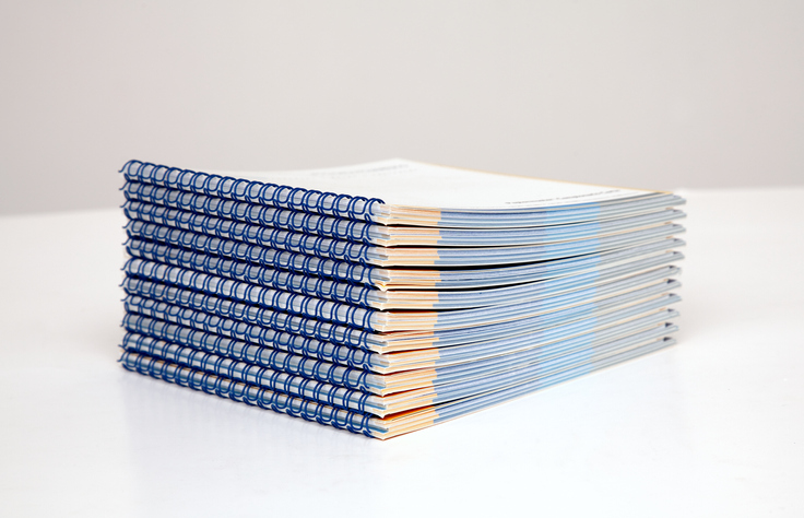 Stack of spiral notebooks