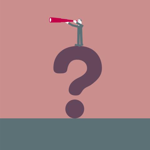 Person standing on question mark