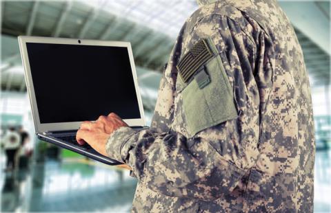 Veteran CPA working on computer